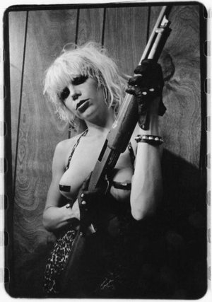 Plasmatics Wendy O_ Williams posing with a shotgun, ca. 1983.jpg