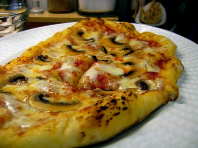 Mushroom pizza with mozzarella and fontina on a crust from Whole Foods.jpg