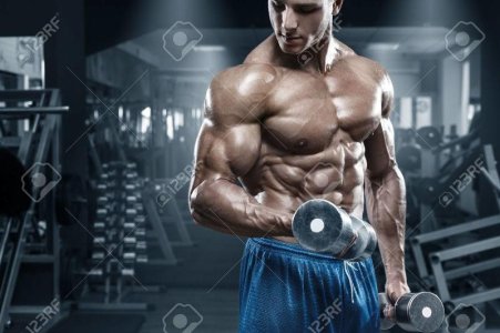 working out-in-gym-doing-exercises-with-dumbbells-bodybuilder-male-naked-torso-abs.jpg