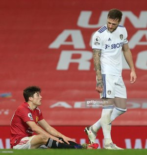 MANCHESTER-ENGLAND-DECEMBER-20-Daniel-James-of-Manchester-United-lies-injured-during-the-Premier.jpg