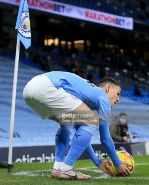 MANCHESTER-ENGLAND-FEBRUARY-13-Phil-Foden-of-Manchester-City-prepares-to-take-a-corner-during-th.jpg