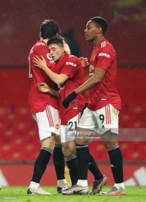 MANCHESTER-ENGLAND-FEBRUARY-02-Daniel-James-of-Manchester-United-celebrates-scoring-his-teams-ni.jpg