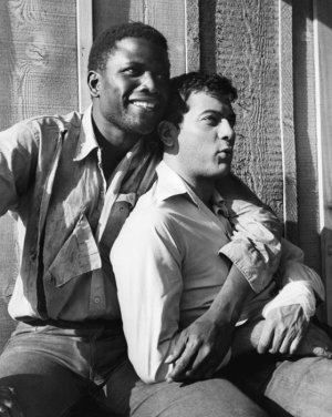 Sidney  Poitier  &  Tony  Curtis  on  movie set  1958 .jpg