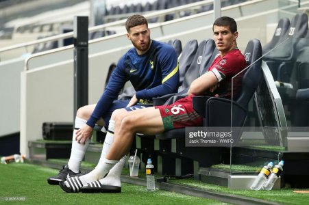 LONDON-ENGLAND-MAY-16-Matt-Doherty-of-Tottenham-Hotspur-L-speaks-with-Conor-Coady-of-Wolverhampt.jpg