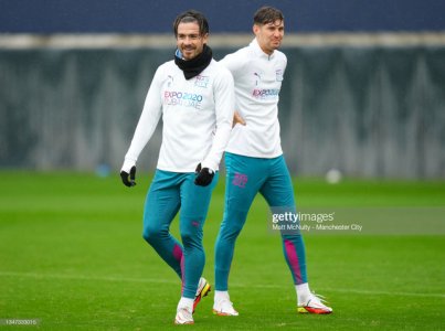 MANCHESTER-ENGLAND-OCTOBER-18-Jack-Grealish-and-John-Stones-of-Manchester-City-in-action-during-.jpg