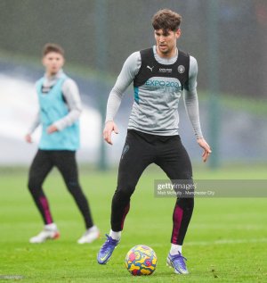 MANCHESTER-ENGLAND-NOVEMBER-18-John-Stones-of-Manchester-City-in-action-during-a-training-sessio.jpg