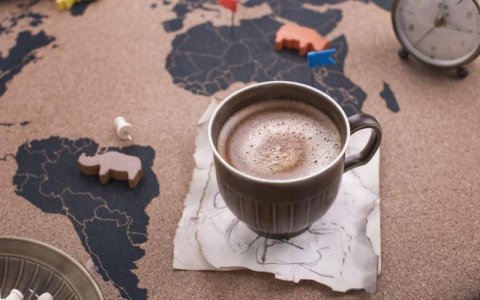 Cup-of-hot-chocolate-with-a-map-of-the-world.jpg