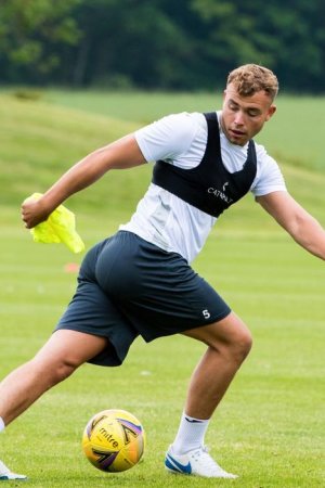 EDINBURGH-SCOTLAND-JUNE-28-Ryan-Porteous-L-and-Paul-Mc-Ginn-are-pictured-as-Hibs-return-to-pre-s.jpg