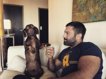 Ali Rad and Freddie, who thinks he's a penguin..jpg