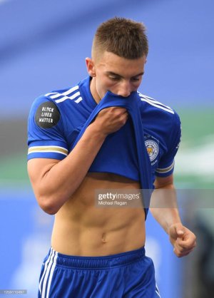 LEICESTER-ENGLAND-JULY-26-Luke-Thomas-of-Leicester-City-wipes-his-face-during-the-Premier-League.jpg