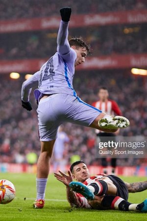 BILBAO-SPAIN-JANUARY-20-Nico-Gonzalez-of-FC-Barcelona-is-tackled-by-Yuri-Berchiche-of-Athletic-C.jpg